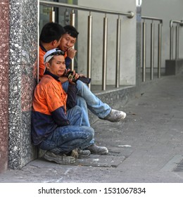 Sydney, NSW / Australia - October 2 2019: Working Holiday Visas A Kick In Guts To Unemployed Aussies. Pictured Are Construction Workers On A Break In The Central Business District.