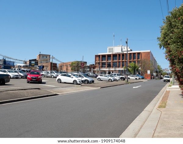 Sydney NSW Australia - October 9th 2020 - \
Gladesville Car Park and Local RSL Facade Background Blur on a\
sunny autumn afternoon