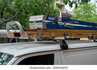 Sydney NSW Australia September 2021: Trade Repair Van With Ladders On Roof Of Van On The Road