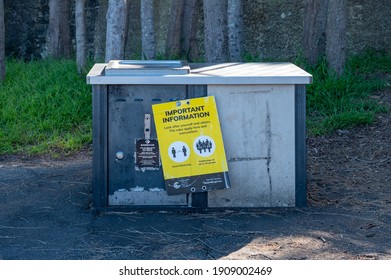 Sydney NSW Australia - September 9th 2020 - Covid-19 Social Distancing Sign Hanging On Public BBQ At Collins Beach On A Sunny Spring Afternoon