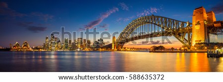 Sydney. Panoramic image of Sydney, Australia with Harbour Bridge during twilight blue hour.