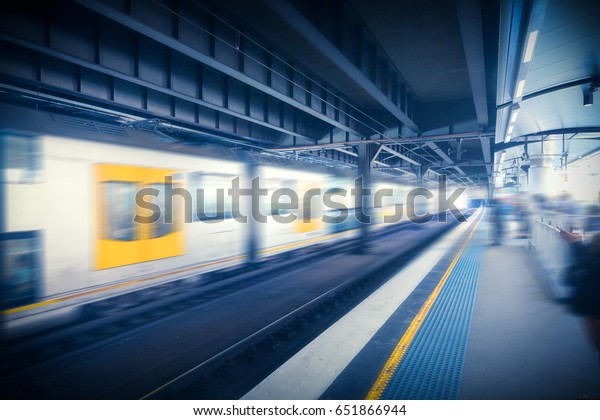 \
Sydney subway station, subway car movement\
blurred scene