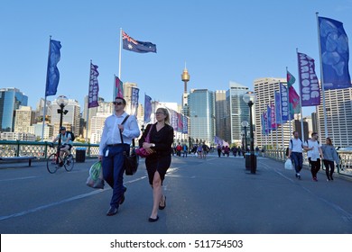 SYDNEY-OCT 20 2016:Australian people crossing the Pyrmont Bridge at in Darling Harbour, a recreational and pedestrian precinct western to Sydney central business district in New South Wales, Australia