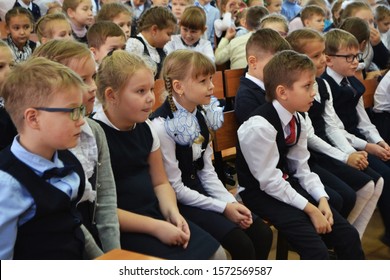 Syktyvkar, Russia - October, 2018. Primary School Students Are Sitting At A Concert In The School Assembly Hall.