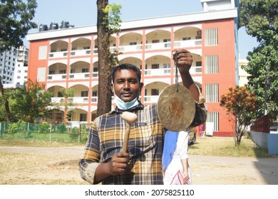 Sylhet, Bangladesh - 14 November 2021: An Employee Is Ringing The School Holiday Bell In Front Of The School.