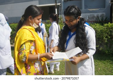 Sylhet, Bangladesh - 14 November 2021: After SSC (Secondary School Certificate) Examination, Students Are Talking With Question Papers In Front Of The Examination Center.