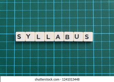 Syllabus word made of square letter word on green square mat background.