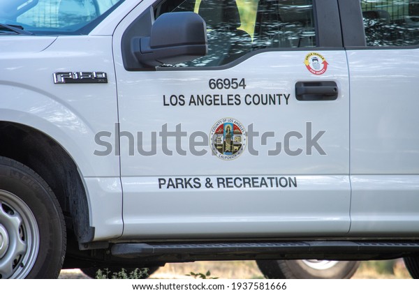 Sylmar, California, United
States - October 21, 2020: Los Angeles County Parks and Recreation
workers improve a trail at Veterans Memorial Community Regional
Park.