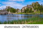 Sylvan Lake in Custer State Park of the Black Hills, South Dakota, United States: Tranquil popular place for swimming, canoeing, hiking, picnicking and rock climbing