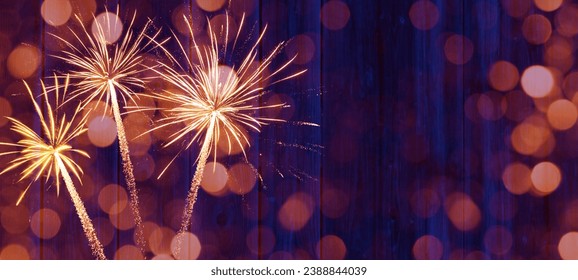 Sylvester 2024, New Year's Eve, New Year background banner - Firework Fireworks on rustic blue wooden wood texture	
