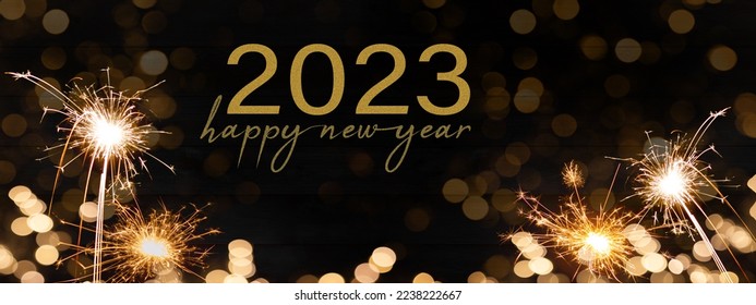 Sylvester, New Year's Eve 2023 Party, Happy New year, Fireworks, Firework background banner greeting card with text - Sparklers and bokeh lights on black wooden wall texture	 - Shutterstock ID 2238222667