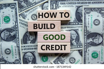 Symbol of building success foundation. Stack of wooden blocks. Words 'how to build good credit'. Beautiful background from dollar bills. Business and build good credit concept.