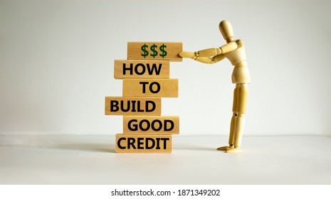 Symbol Of Building Success Foundation. Stack Of Wooden Blocks. Words 'how To Build Good Credit'. Model Of Human. Beautiful White Background. Business And Build Good Credit Concept.