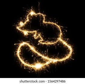 Symbol Of Chinese New Year Rat Made By Sparkler . Year Of The Rat. Chinese Calendar Symbol Hand-made Sparkling Sparklers . Isolated On A Black Background . Overlay Template For Holiday Greeting Card