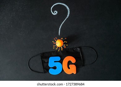 Symbol Of Coronavirus And 5g Network Next To A Medical Mask. The Effect Of 5g Networks On Coronavirus