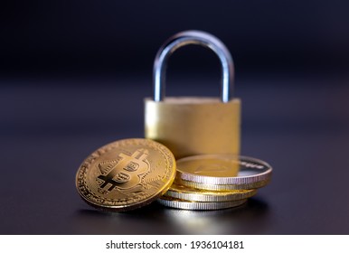 Symbol for Cryptocurrency security. A stack of Bitcoins in front of a lock.