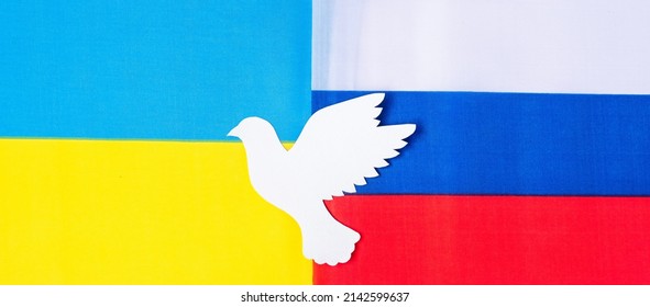 Symbol Of Dove Peace With Flag Of Ukraine. And Russia Pray, No War, Stop War And Nuclear Disarmament