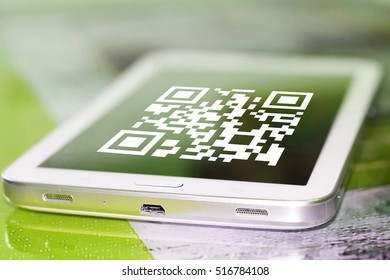 The symbol gr code on the cell phone screen .