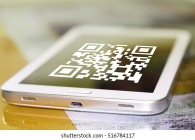 The symbol gr code on the cell phone screen .