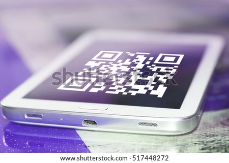The symbol gr code on the cell phone screen . 