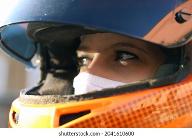 Symbol Image: Female Race Car Driver Wears Helmet And Balaclava (Model Released)