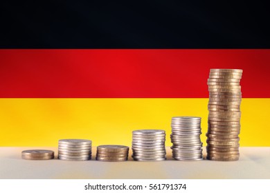 Symbol Of Inflation And Diagram Of Coins With The Background Of The Germany Flag