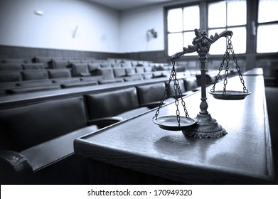 Symbol of law and justice in the empty courtroom, law and justice concept, blue tone
