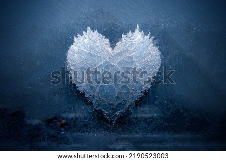 Symbol of love from cold ice. Beautiful heart made of ice. Brilliant piece of ice in the shape of a heart. An unusual gift for Valentine's Day.