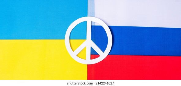 Symbol Of Peace With Flag Of Ukraine. And Russia Pray, No War, Stop War And Nuclear Disarmament