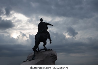 Symbol of Saint-Petersburg, monument The Bronze Horseman to the founder of St Petersburg, Peter the Great, facing the Neva River. Classic view with menacing murky skies on a stormy day.