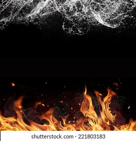 Symbol Of Water And Fire Energy, Isolated On Black Background