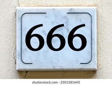 The symbolic number 666 (six hundred sixty six) also known as angel number or number of the beast in numerology 