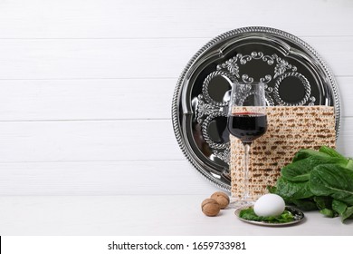 Symbolic Pesach (Passover Seder) Items On White Table, Space For Text