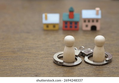 Symbolizing the inescapable financial commitment of co-owning a property and the stress of being locked into a long-term debt.
