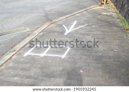 Similar – Pink arrows on the sidewalk