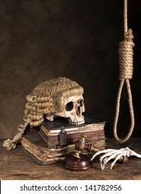 Symbols of death penalty like noose, judge's wig and skull