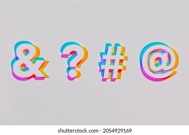 Symbols and signs for internet communications. social media. At symbol. pound sign. Hashtag. Ampersand or and sign. Question mark. Colorful photograph. Image artists own.