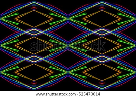 Symmetric abstract blurred futuristic  background of blue, red,  greenyellow colors
