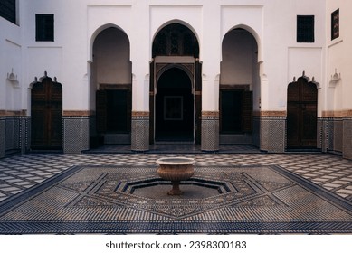 A symmetrical Riad (a traditional Moroccan courtyard) with beautiful patterns at the Dar Si Said Museum in Marrakesh, Morocco