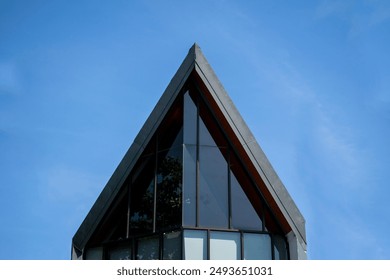 Symmetrical triangle roof minimalist modern building - Powered by Shutterstock