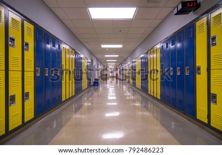 Symmetrical view of a school hallway with lockers on each side