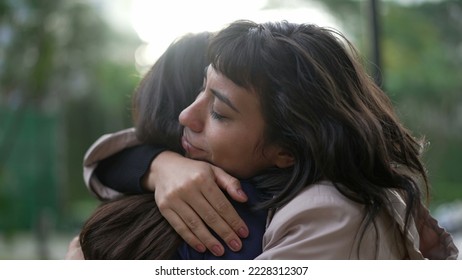 Sympathetic woman hugging friend with EMPATHY and SUPPORT. Friendship concept between two best friends - Powered by Shutterstock