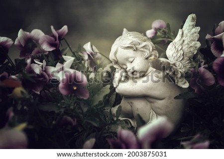 Sympathy card with guardian angel and spring flowers	