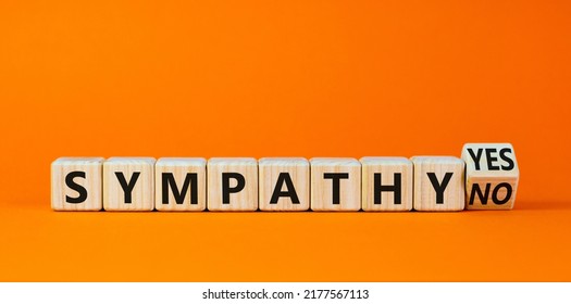 Sympathy Yes Or No Symbol. Turned A Wooden Cube And Changed Words 'sympathy No' To 'sympathy Yes'. Beautiful Orange Background. Business And Sympathy Yes Or No Concept, Copy Space.