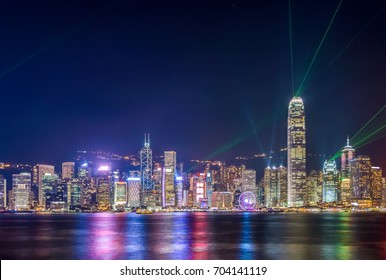 A Symphony Of Lights Show In Hong Kong. Cityscape Panorama View From Victoria Harbour.