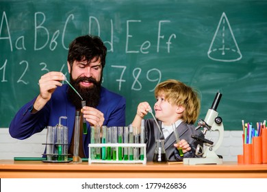 Symptoms Of ADHD At School. Perseverance Pays Off. Attention Deficit Hyperactivity Disorder. Teacher Child Test Tubes. School Lesson. Chemical Experiment. Difficult Focus And Complete School Tasks.