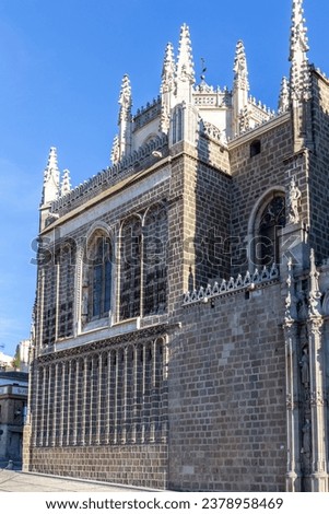 Synagogue of Santa Maria la Blanca (Ibn Shoshan Synagogue) in Toledo, Spain, Renaissance brick facade with towers and carved spires, porticoes and arches.