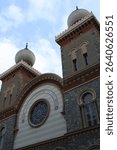 Synagogue of Turin (Tempio Israelitico) Moorish Revival Facade with Onion‑Dome Towers in Urban Setting