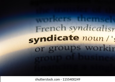 syndicate word in a dictionary. syndicate concept. - Shutterstock ID 1155400249