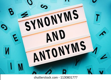 Synonyms and antonyms concept with letters and lightbox - Shutterstock ID 1130801777